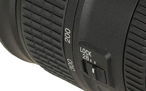 O interruptor da trava de foco na Lente Nikon NIKKOR AF-S 28-300mm f/3.5-5.6 ED VR.